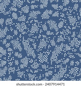 Blue seamless pattern with white floral silhouettes. Simple scattered repeat pattern. For textile, wallpaper, packaging, DIY projects.