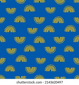 Blue seamless pattern with yellow rainbows