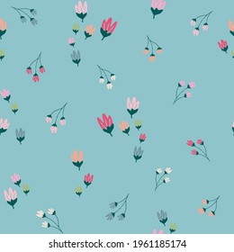 Blue seamless print spaced out conversational pattern with colorful spaced out random, fading doodle flowers, stems and petals and clusters