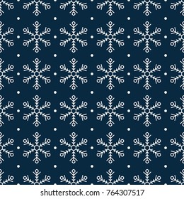 Blue seamless snowflake pattern. Christmas vector background. White snowflakes on a blue background. Pattern swatches included in eps-file, for your convenient use.