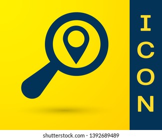 Blue Search location icon isolated on yellow background. Magnifying glass with pointer sign. Vector Illustration