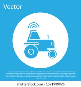 Blue Self driving wireless tractor on a smart farm icon isolated on blue background. Smart agriculture implement element. White circle button. Vector Illustration