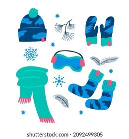 Blue set winter warm sports or ski wear and accessories, mittens, hat, scarf, goggles and socks. Clothed flat vector cartoon illustration of winter-time activity isolated on white background.