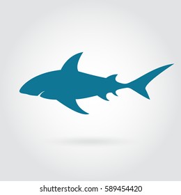 Blue shark silhouette with sharp fins.