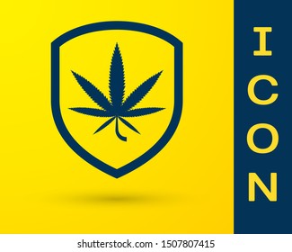 Blue Shield and marijuana or cannabis leaf icon isolated on yellow background. Marijuana legalization. Hemp symbol.  Vector Illustration