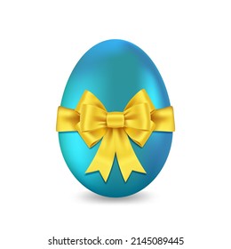 Blue shiny Easter egg with yellow silk bow. Easter souvenir.