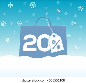 Blue shopping bag with 20% text and a snowflake percent design price tag label on it on snow background. For winter sale campaigns.