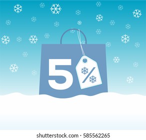 Blue shopping bag with 5% text and a snowflake percent design price tag label on it on snow background. For winter sale campaigns.