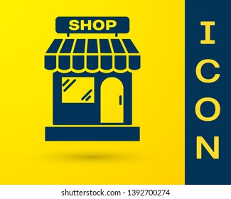 Blue Shopping building or market store icon isolated on yellow background. Shop construction. Vector Illustration