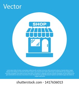 Blue Shopping building or market store icon isolated on blue background. Shop construction. White circle button. Vector Illustration