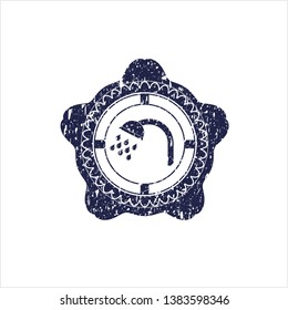 Blue shower icon inside distress with rubber seal texture