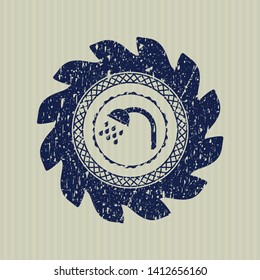 Blue shower icon inside distress rubber grunge texture stamp