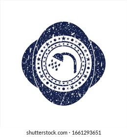 Blue shower icon inside distress rubber stamp with grunge texture