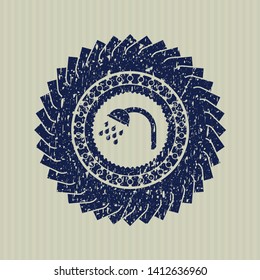 Blue shower icon inside distressed grunge stamp