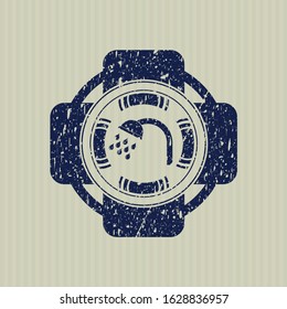 Blue shower icon inside rubber stamp with grunge texture