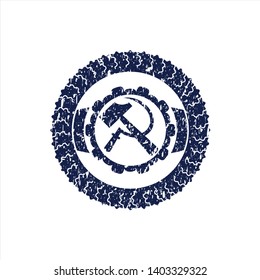 Blue sickle and hammer icon inside distress rubber grunge stamp