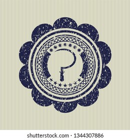 Blue sickle icon inside rubber seal with grunge texture