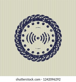 Blue signal icon inside distressed rubber grunge stamp