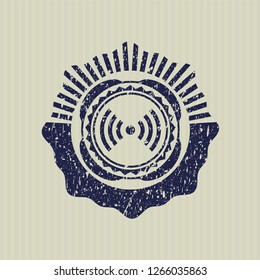 Blue signal icon inside grunge seal