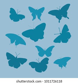 Blue silhouettes of butterflies on a gray background. A flat vector image of a silhouette of butterflies. Butterfly logo. Set of elegant butterflies.