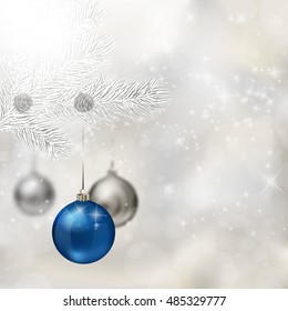 Blue and silver Christmas balls with fir tree branch on abstract light grey background. Xmas greeting card. Vector eps10 illustration