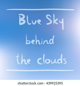 Blue sky behind the clouds doodle hand draw text font on white blue blur background.