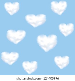 Blue sky and clouds shaped heart