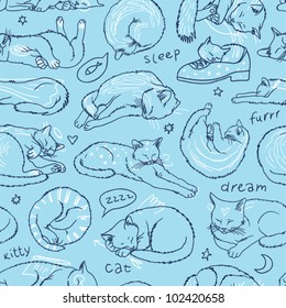 Blue sleeping cats seamless pattern