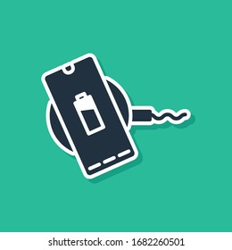 Blue Smartphone charging on wireless charger icon isolated on green background. Charging battery on charging pad.  Vector Illustration