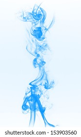 Blue smoke on the light blue background.
