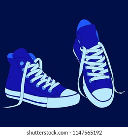 Blue sneakers with white laces on the blue background.