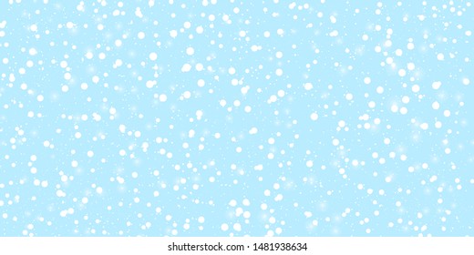 Blue snow background. Winter sky. Merry Christmas. Light blue space background. New year. Cold season. Falling snow.