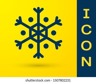 Blue Snowflake icon isolated on yellow background.  Vector Illustration