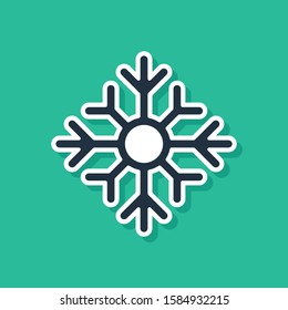Blue Snowflake icon isolated on green background. Merry Christmas and Happy New Year.  Vector Illustration