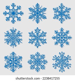 Colección de iconos de copo de nieve azul aislados en fondo blanco.
