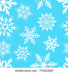 Blue snowflake pattern. Christmas ornamental background.