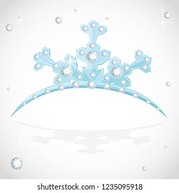 Blue snowflake shaped tiara for Christmas ball on a white background