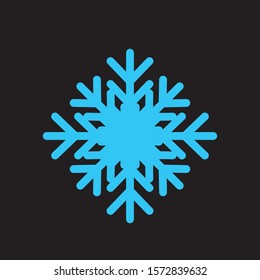 Blue snowflake silhouette. Isolated snowflakes against a black background.