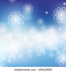 Blue snowflakes Background With Bokeh And Blur. Vector EPS 10 illustration.