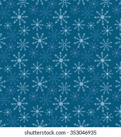 blue snowflakes on dark background seamless