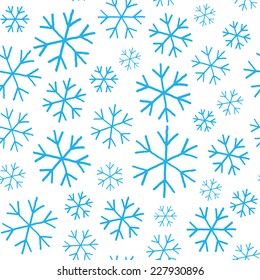 Blue  snowflakes on white background seamless pattern