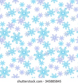 Blue snowflakes on a white background. Wallpaper, texture, background. Seamless.
