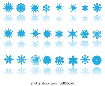 blue snowflakes on white background with reflection