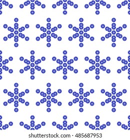 Blue snowflakes on a white background. Ice crystals. Seamless pattern.