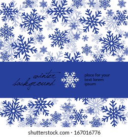 Blue snowflakes on white, place for text