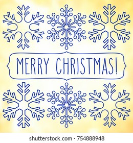 Blue snowflakes over square abstract smooth blur background with hand Christmas greetings in a frame.