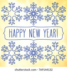Blue snowflakes over square abstract smooth blur background with hand written new year greetings in a frame.