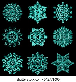 Blue snowflakes set in abstract style. Ornamental artistic vector illustration in blue colors for Merry christmas cards. New Year 2017-2018 collection. Freehand ethnic Xmas sketch.