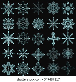 Blue snowflakes vector set. Isolated on black background.