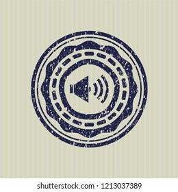 Blue sound icon inside distress rubber grunge seal